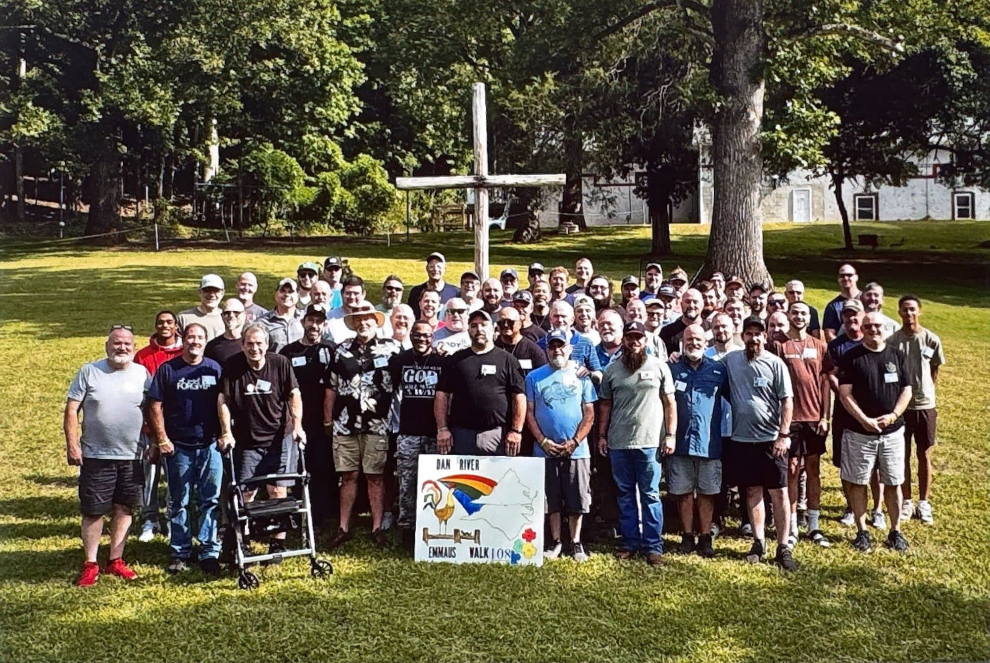 Pilgrims and team of Dan River Emmaus Walk #108 gathered at the cross at Springs of Life Camp